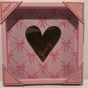 Juicy Couture Cavas Wall Hanging Art with attachment for hanging on the back.
